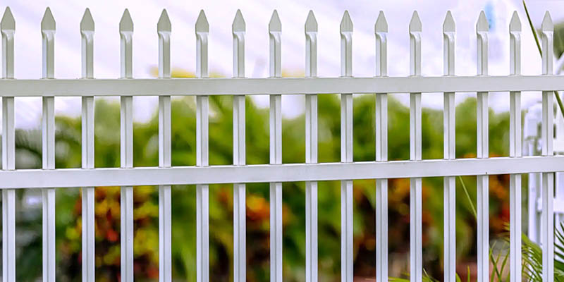 White residential aluminum fence installation in Salt Lake City, Utah